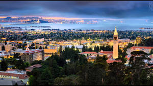 Prominent Sather Tower Dominating The Scenic Ucb Campus Wallpaper