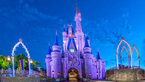 Purple Disneyland Castle And Blue Sky Wallpaper