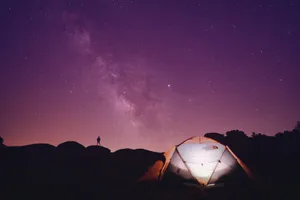 Purple Galaxy Man And Tent Wallpaper