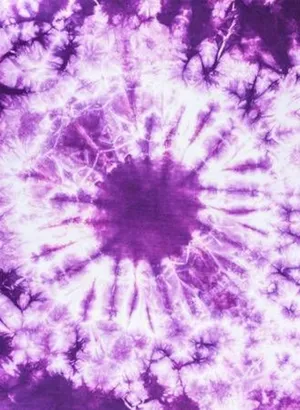 Purple Tie Dye Fabric With A White Flower Wallpaper