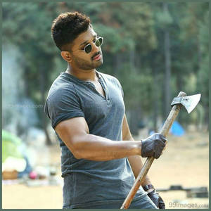 Pushpa Allu Arjun Holding An Axe Wallpaper