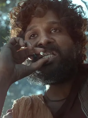 Puspa Unveiling Life's Ruggedness Through A Smoke Wallpaper