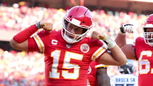 Quarterback Pat Mahomes On His Phone Wallpaper