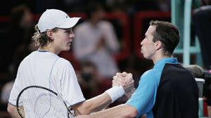 Radek Stepanek And Tomas Berdych Celebratory Handshake After A Match Wallpaper