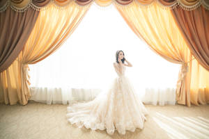 Radiant Bride Gazing Into Distance Wallpaper