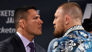 Rafael Dos Anjos Conor Mcgregor Intense Gaze Wallpaper