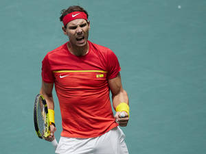 Rafael Nadal Multicolored Tennis Outfit Wallpaper
