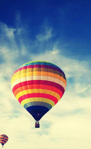 Rainbow Hot Air Balloon In The Clouds Wallpaper