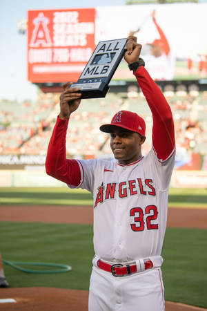 Raisel Iglesias In Action During A Baseball Game Wallpaper