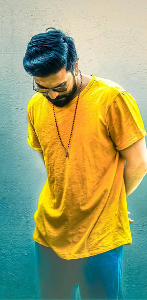 Ram Charan In A Yellow Shirt Wallpaper