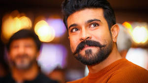 Ram Charan Looking Sophisticated In A Knitted Sweater Wallpaper