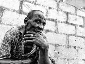 Random Person Against A Wall Wallpaper