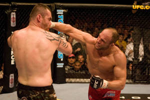 Randy Couture Solid Hit Wallpaper