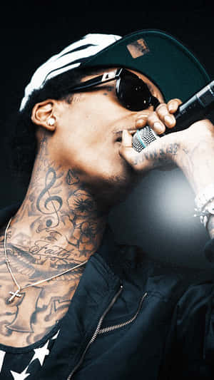 Rapper_ Performing_ On_ Stage.jpg Wallpaper