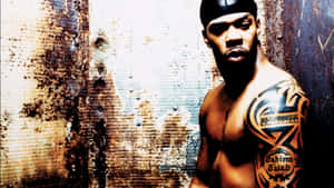 Rapper_with_ Tribal_ Tattoos Wallpaper