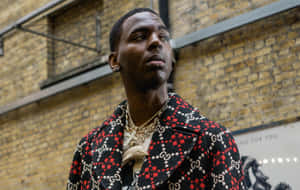 Rapper Young Dolph Performing Live On Stage Wallpaper