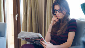 Reading Woman With Eyeglasses Wallpaper