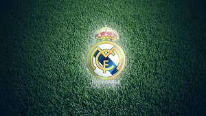 Real Madrid Cf Grassy Logo Wallpaper