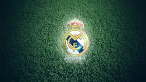 Real Madrid Cf Grassy Logo Wallpaper