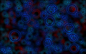 Red And Light Blue Interlocking Neon Circles Wallpaper