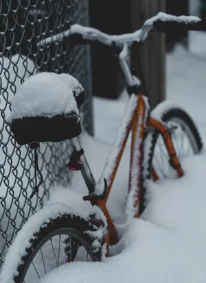 Red Bike Covered In Snow Wallpaper