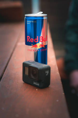 Red Bull And Gopro On Table Wallpaper