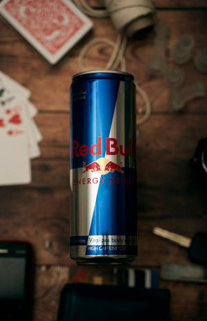Red Bull Can With Cards Table Wallpaper