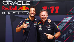 Red Bull Racing - Daniel Ricciardo Flash A Winning Smile Wallpaper