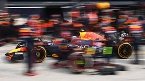 Red Bull Racing Team In Action Wallpaper