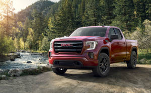 Red Gmc Car Near The River Wallpaper