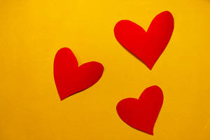 Red Heart On Yellow Wallpaper