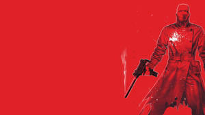 Red Hood Holding A Gun Wallpaper