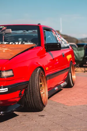 Red Jdm With Stickers Wallpaper