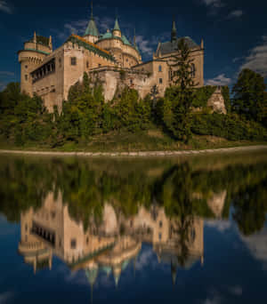 Reflection Of Bojnice Castle In Moat Wallpaper