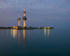 Reflection Of Kuwait Towers At Night Wallpaper