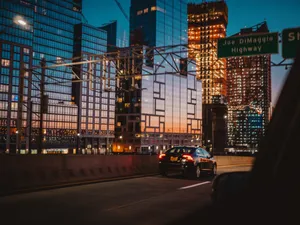 Reflective Building New York City Night Wallpaper
