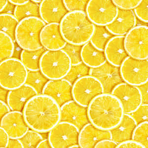 Refresh Your Device With A Lemon Iphone Wallpaper