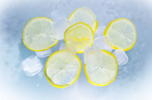 Refreshing Lemon And Ice Cubes Wallpaper