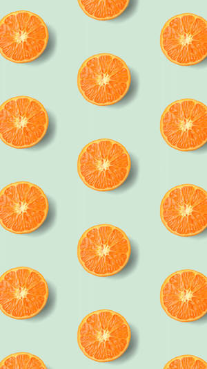 Refreshingly Vibrant Sliced Oranges Pattern Wallpaper