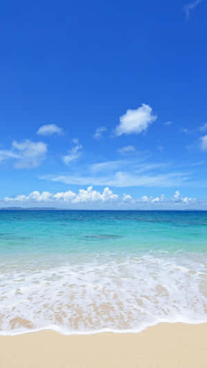 Relax, Unwind And Enjoy The Natural Beauty Of Summer At The Beach Wallpaper