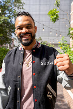 Relaxed And Ready: Rob Font In Casual Attire Wallpaper