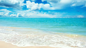 Relaxing View Of A Sunny Beach Wallpaper