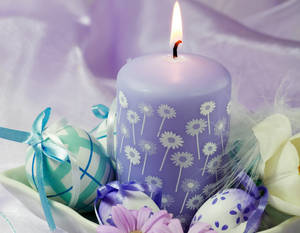 Remember The Reason For This Season This Easter With The Peaceful And Calming Glow Of A Candle. Wallpaper