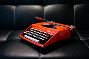 Retro Orange Typewriter Wallpaper
