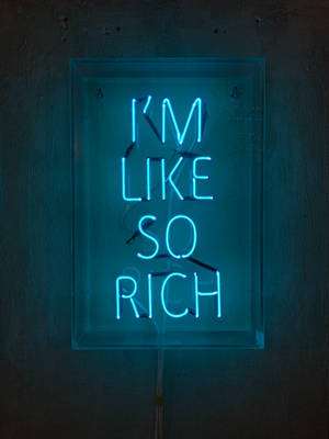 Rich Quote On Neon Blue Iphone Wallpaper