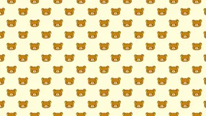 Rilakkuma Sitting Comfortably On A Laptop Wallpaper