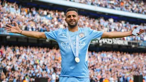 Riyad Mahrez Celebrating With His Champion Medal Wallpaper
