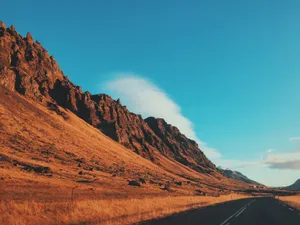 Road Near Desert Mountain Wallpaper