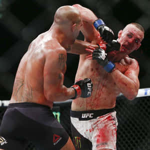 Robbie Lawler Triumphant After His Iconic Fight With Rory Macdonald At Ufc 189 Wallpaper