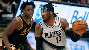 Robert Covington Tries To Escape Opponent Wallpaper